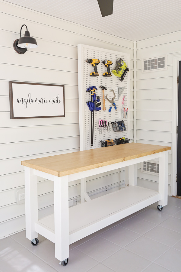 DIY workbench and DIY pegboard stand for tools in small workshop