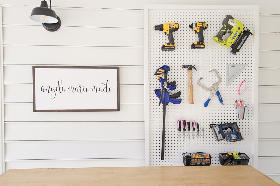 DIY tool pegboard in small workshop