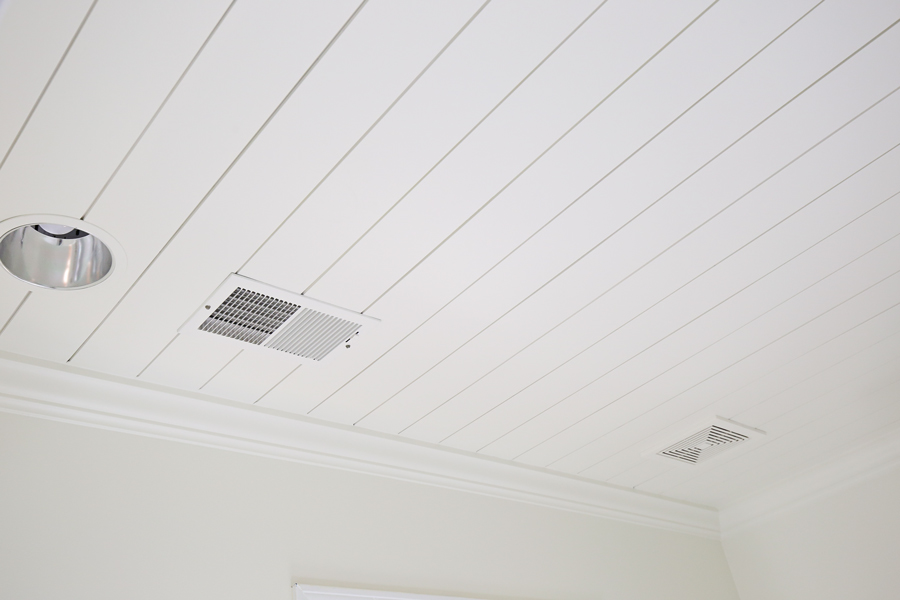 DIY shiplap ceiling with crown molding in bathroom