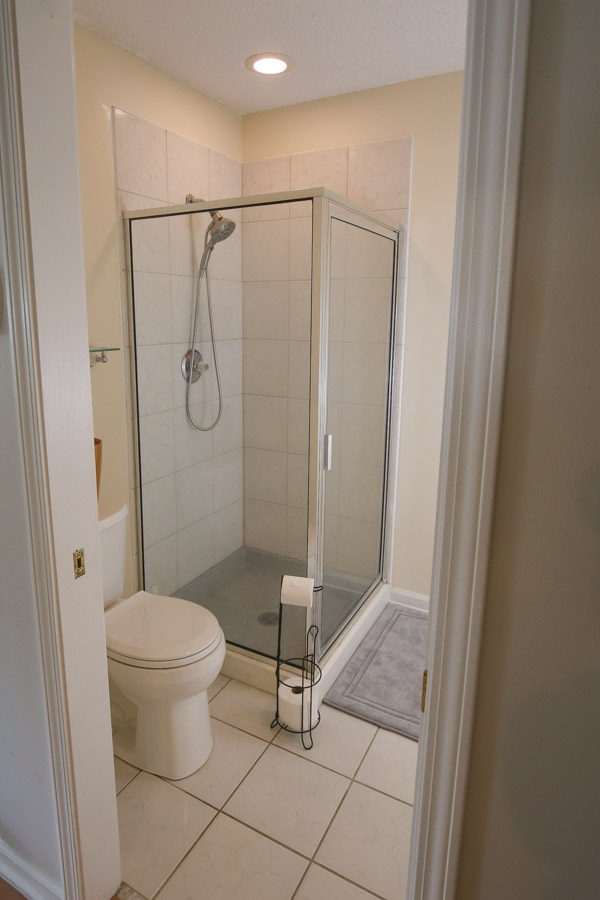 shower popcorn ceiling before bathroom makeover