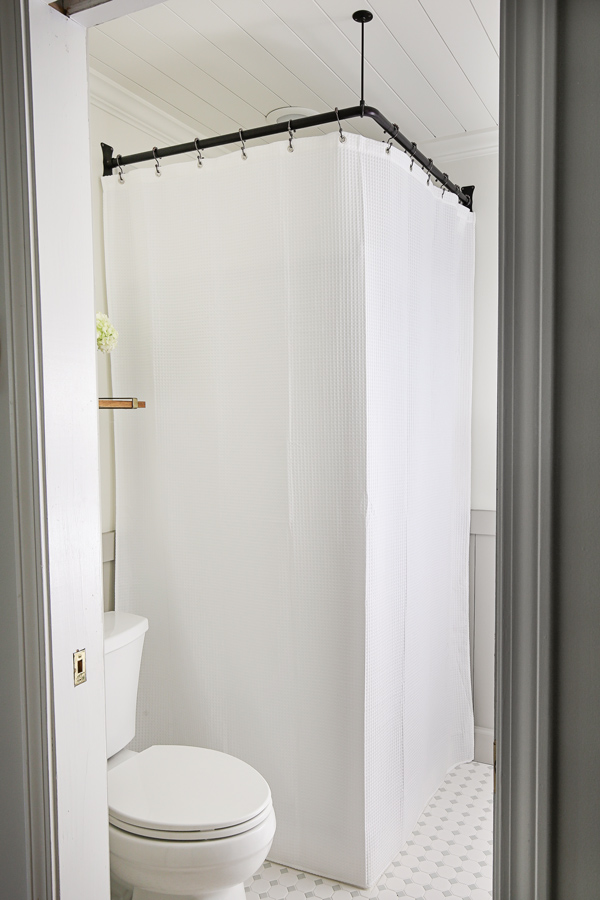 how to hide a corner shower with an extra long shower curtain