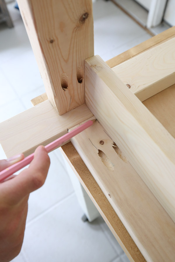 mark board for placement of slat board supports