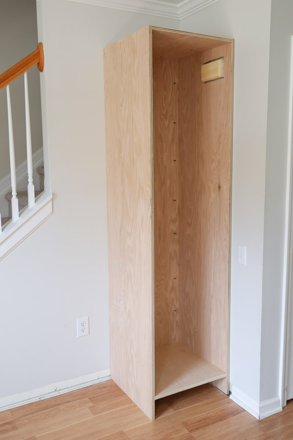 DIY built in cabinet carcass against wall standing up