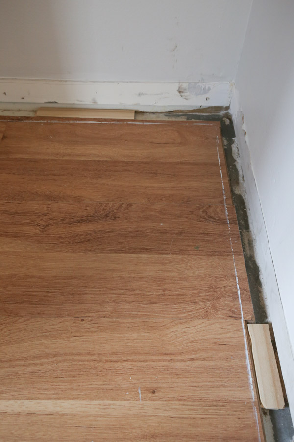 adding wood shims next to flooring