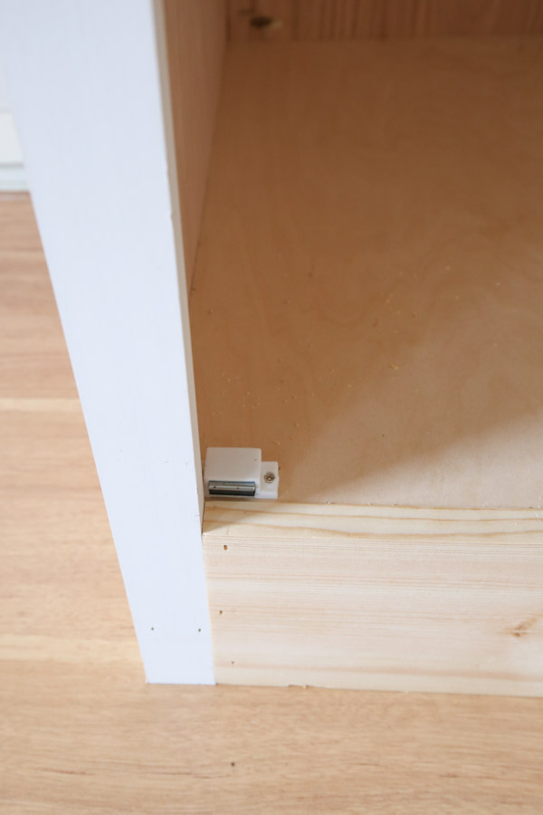 magnetic catch added to built in cabinet door