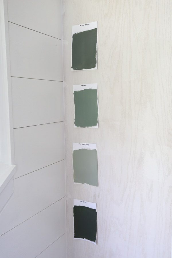 Paint samples of Sherwin Williams pewter green, retreat, evergreen fog and ripe olive