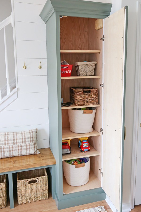 DIY built in cabinet shelves inside of DIY built in cabinet