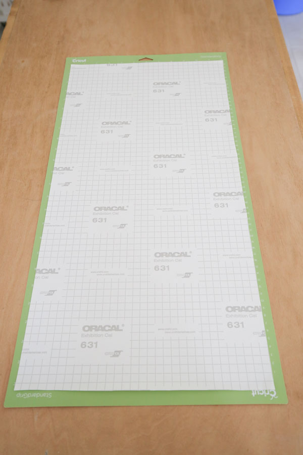 vinyl backing paper on Cricut cutting mat