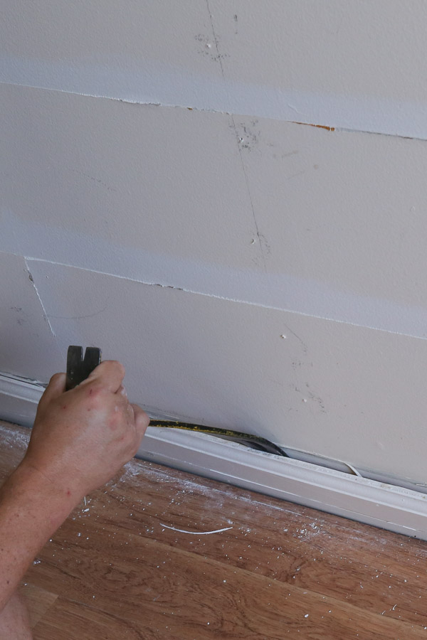 removing baseboard with prybar