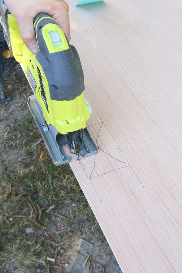 jugsaw cutting out space for wall outlet on plywood