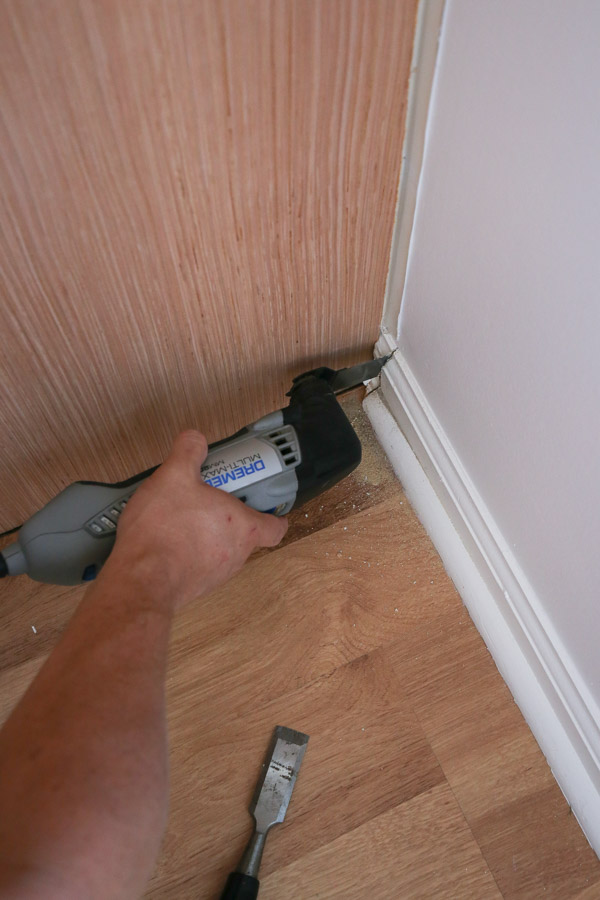 cutting baseboard with Dremel tool