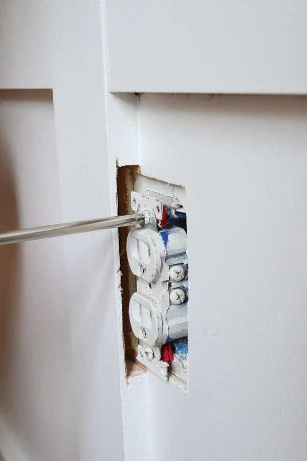 installing wall plate extenders for wall outlet