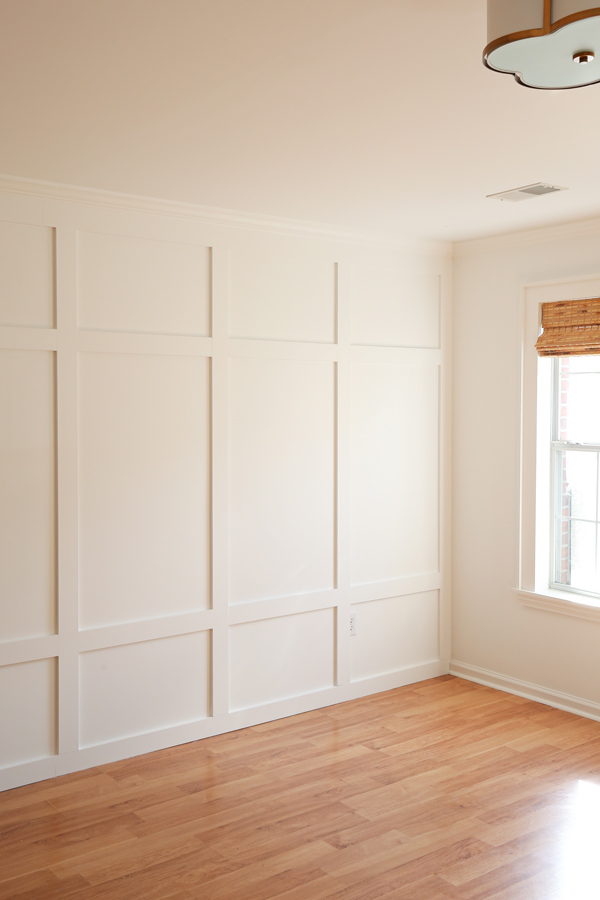 batten board wall painted white in living room