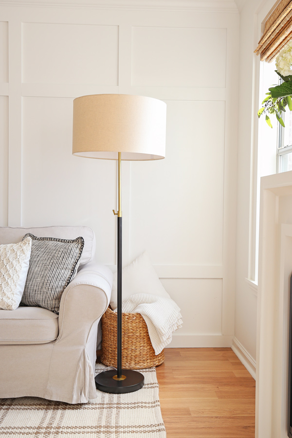 west elm modern floor lamp with brass and black in living room
