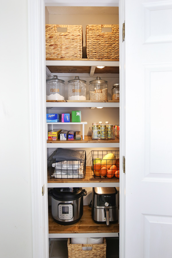 small pantry makeover with 5 wood pantry shelves