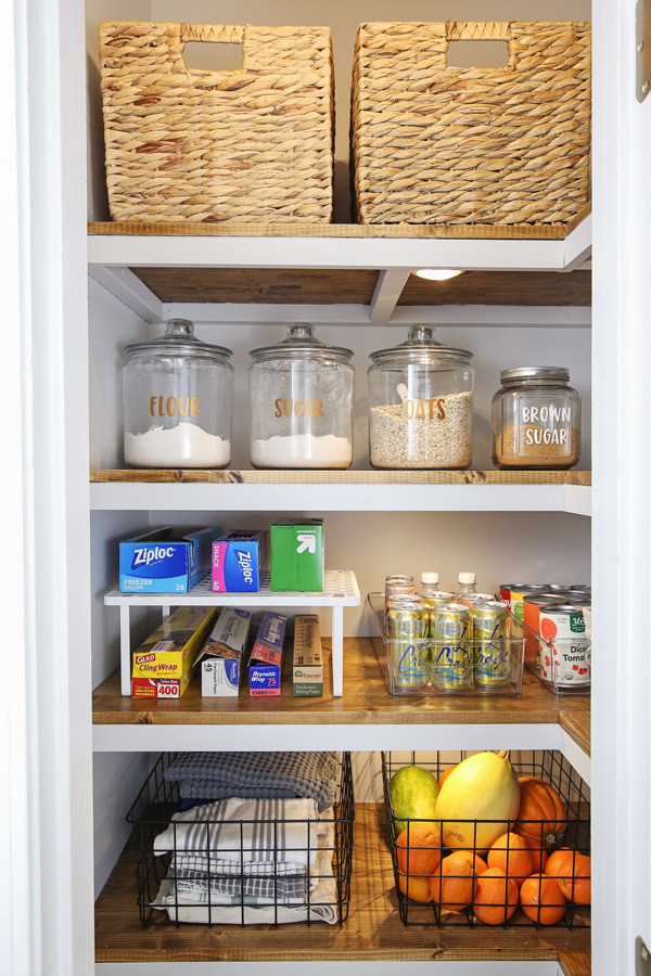 small pantry organization makeover with under shelf lighting