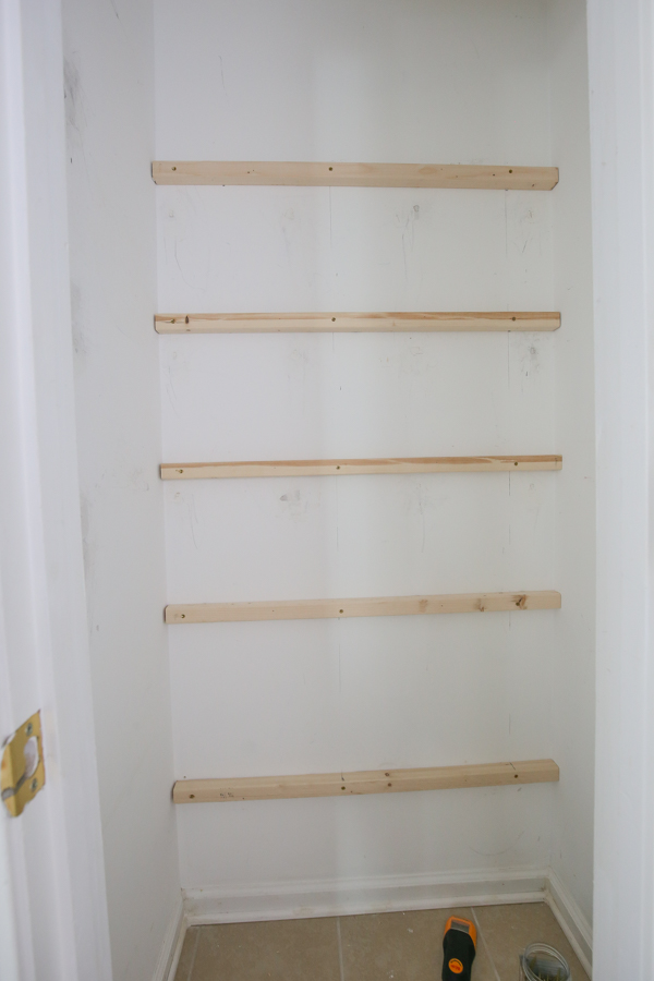 2x2 back wall supports attached to pantry wall