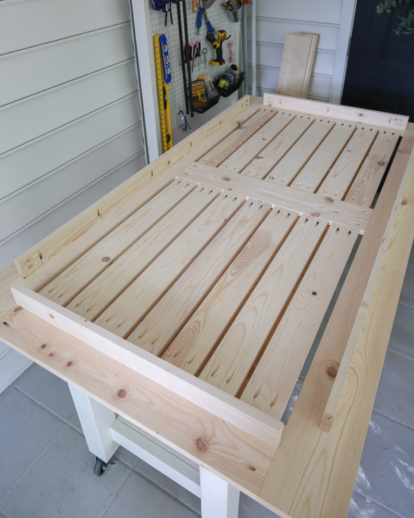 table aprons attached with kreg screws to the diy outdoor table