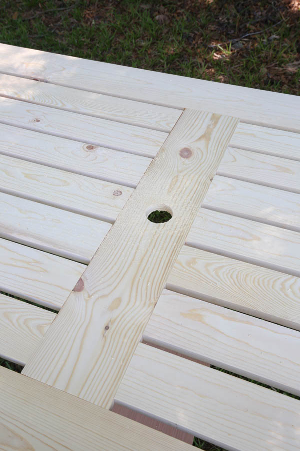 umbrella hole drilled in centered of diy outdoor dining table top