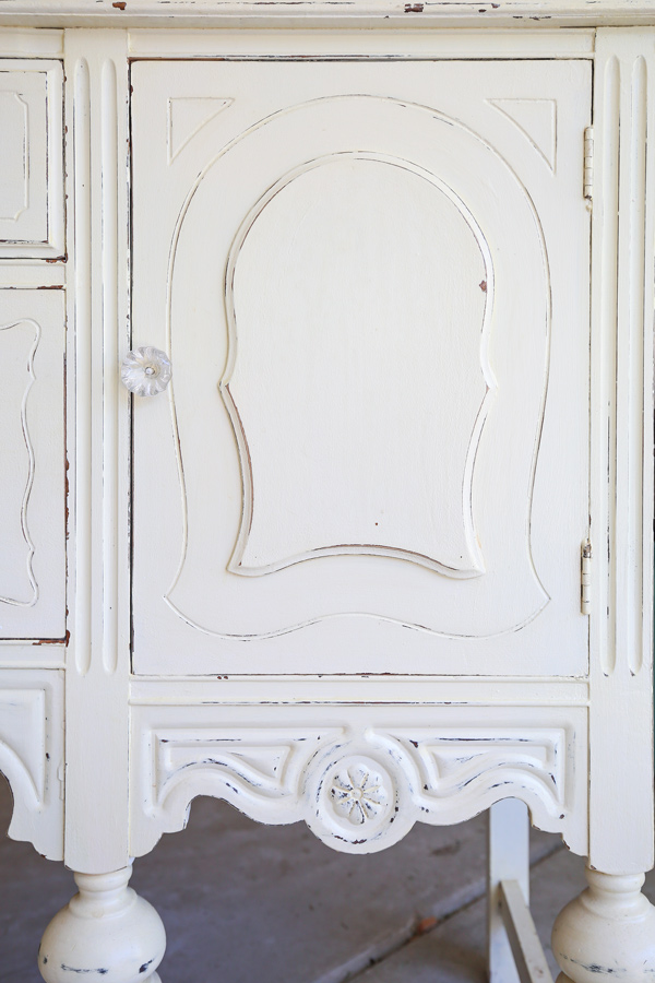 close up of two color distressing with chalk paint on vintage buffet
