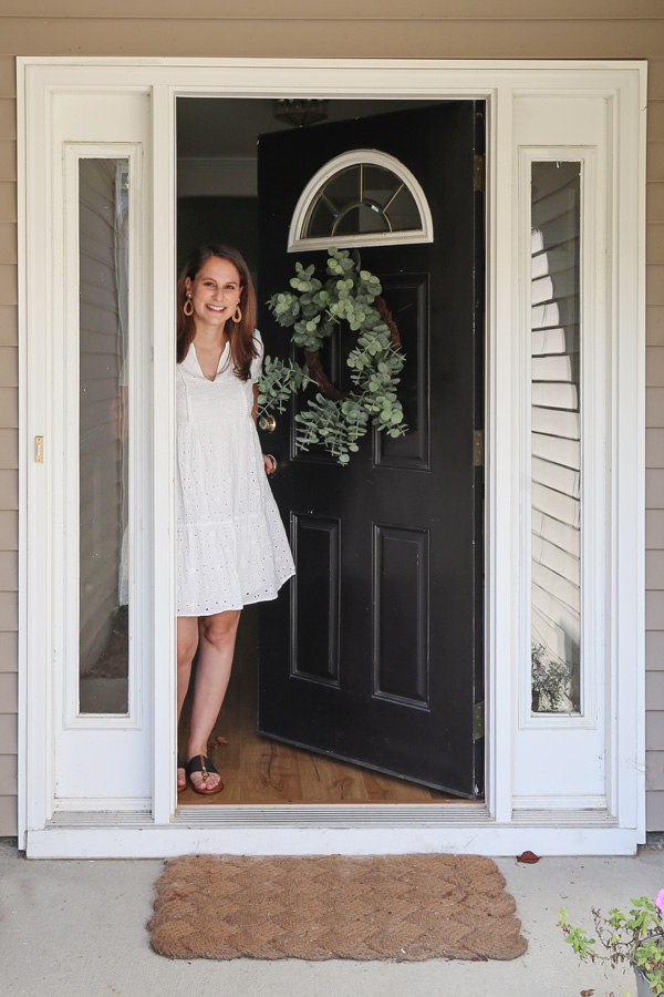 opening the front door of the new house