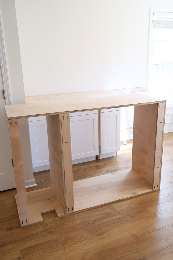 assembling the back of the built in cabinet together with pocket holes