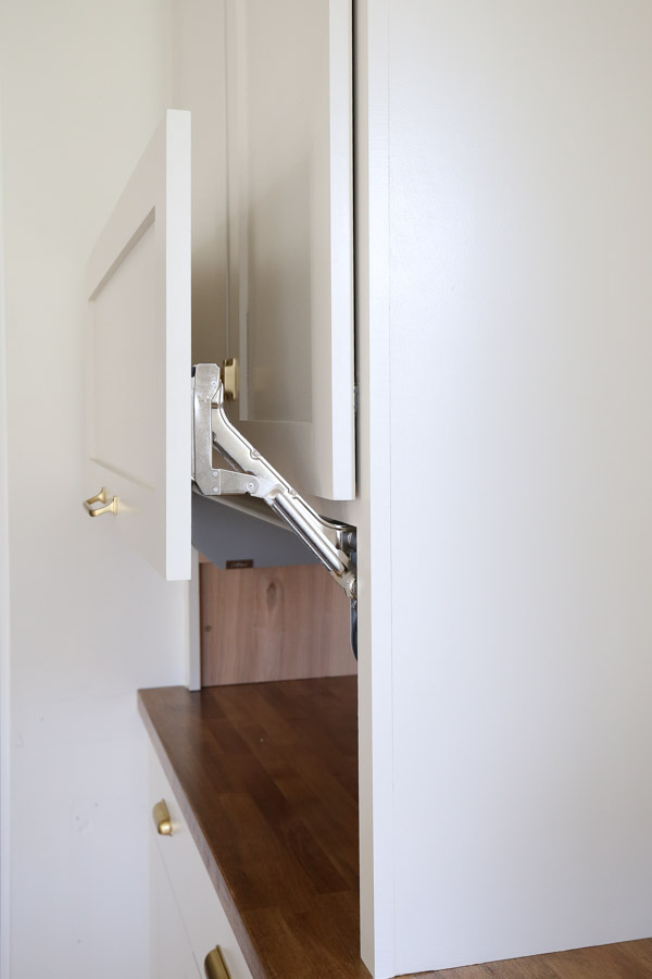 cabinet door sitting a few inches below top of appliance garage DIY