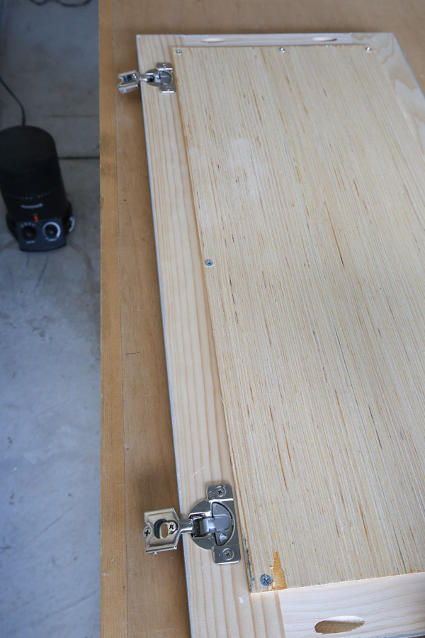 attaching european hinges to the back side of the cabinet door
