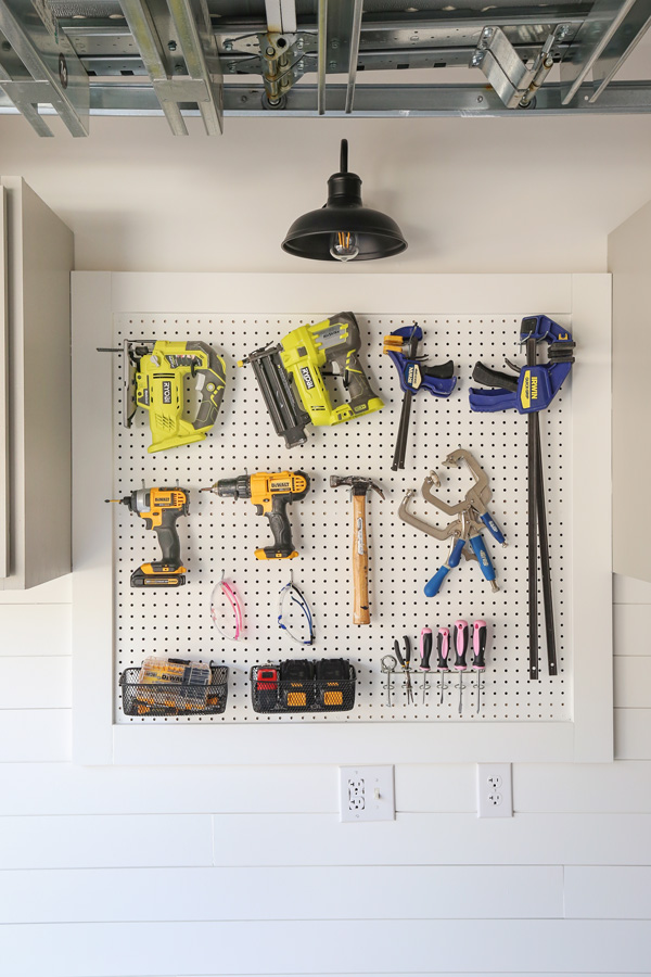 DIY pegboard wall with small tools organized