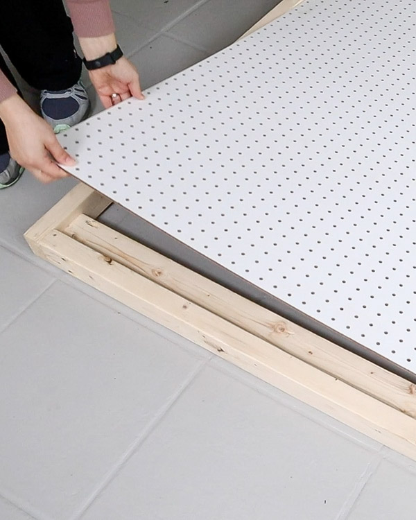 Install the pegboard to the pegboard stand DIY