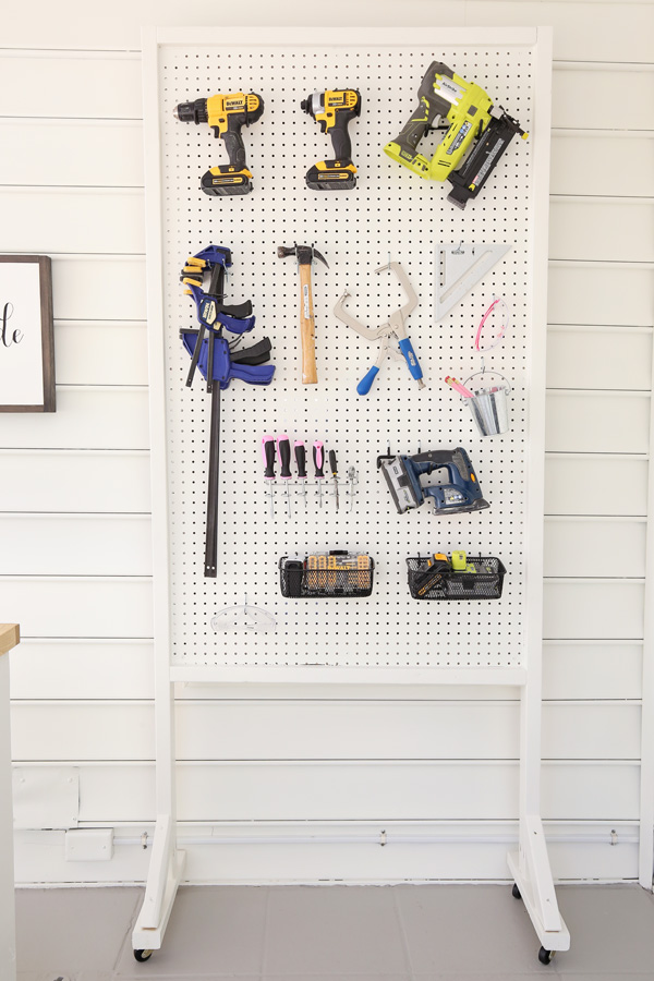 mobile diy pegboard display stand with tools