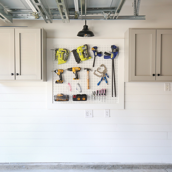 DIY garage cabinets and DIY pegboard wall for DIy garage organization and storage ideas on a budget