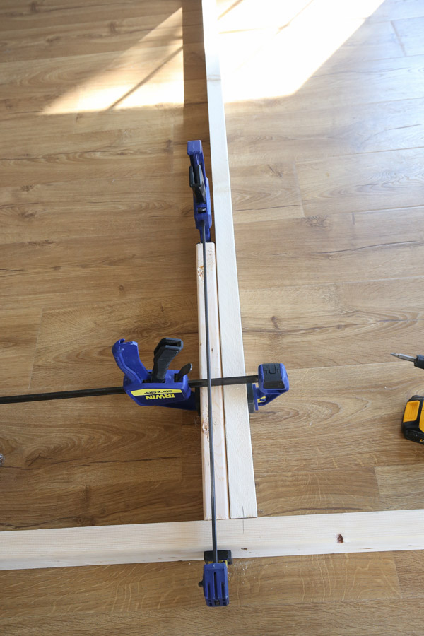 using clamps to help assemble the wall frame together square