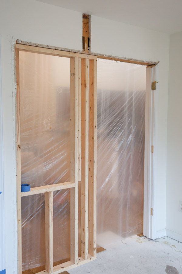 small partition wall built with interior window frame and plastic up