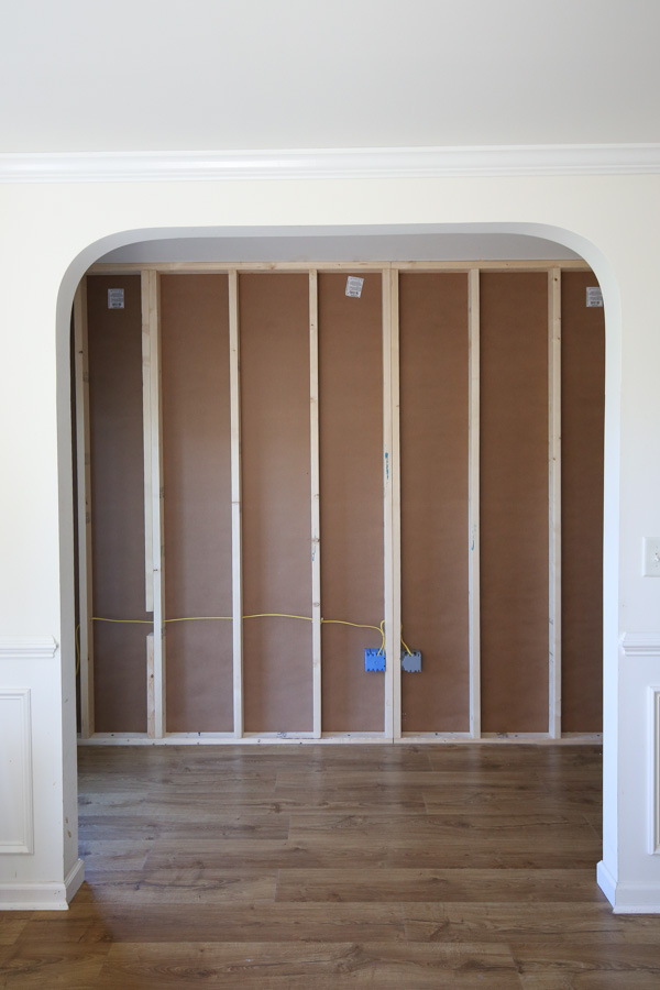 wall before installing vertical shiplap with wall studs