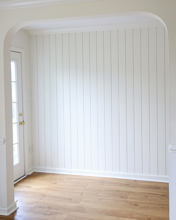 vertical shiplap on wall in hallway