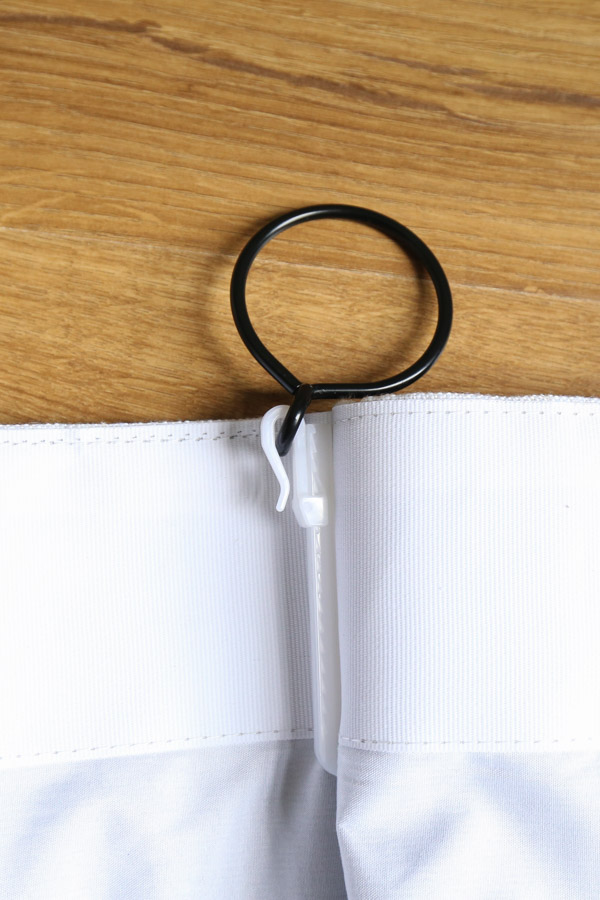 easily adjustable pinch pleat hooks on back of curtain with eyelit curtain ring
