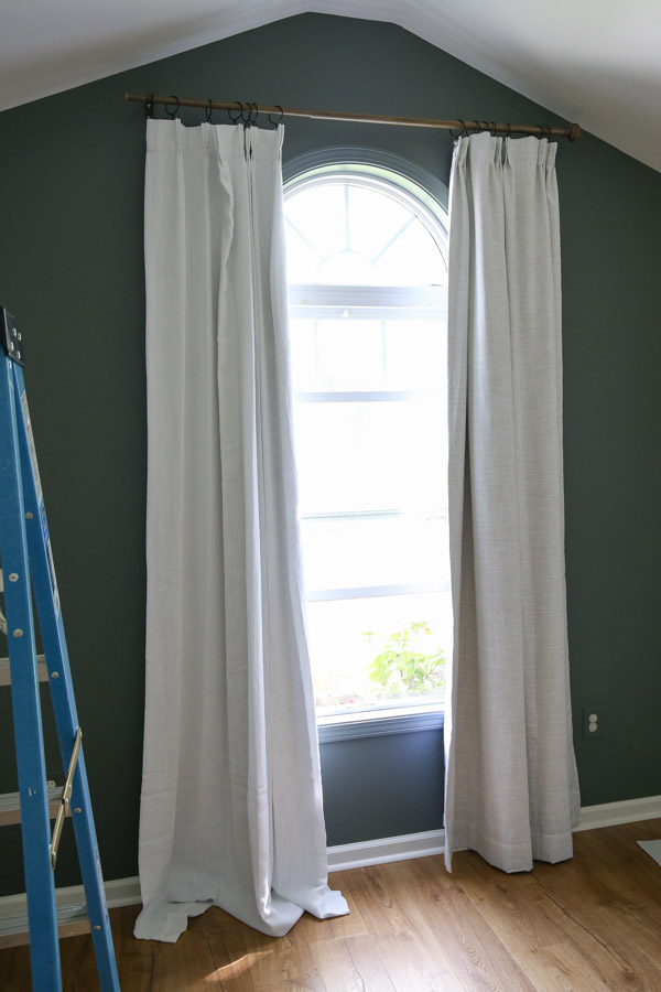comparing two curtain options hanging up on curtain rod
