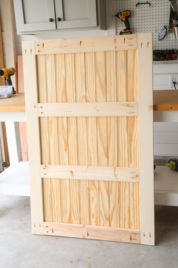 2x4 headboard frames attached to shiplap back view
