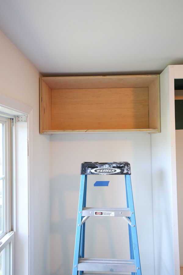 attaching back panel board to diy office storage cabinets