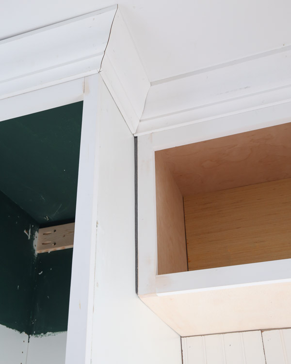 adding backer rod and crown molding to the diy office storage cabinet for the diy built in office cabinets