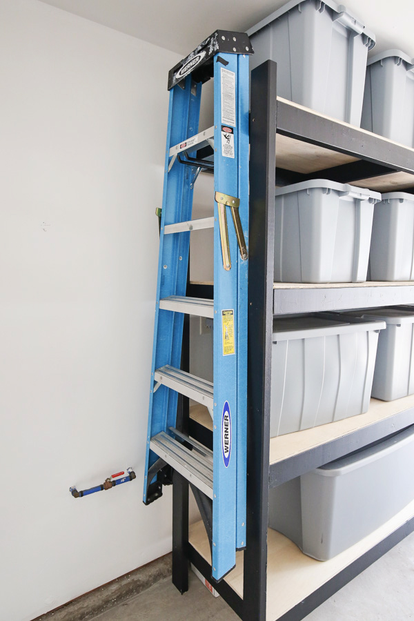 ladder on heavy duty hook for wall garage organization