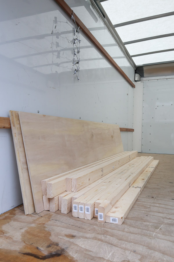 plywood and 2x4s for shelves in truck