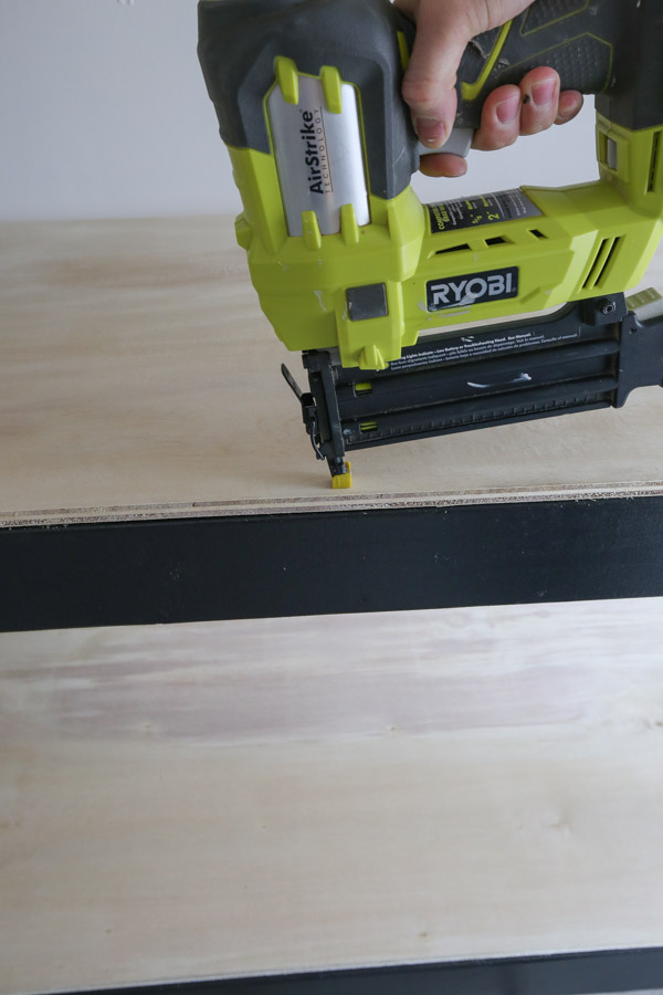 nailing plywood shelves to DIY garage shelves frame