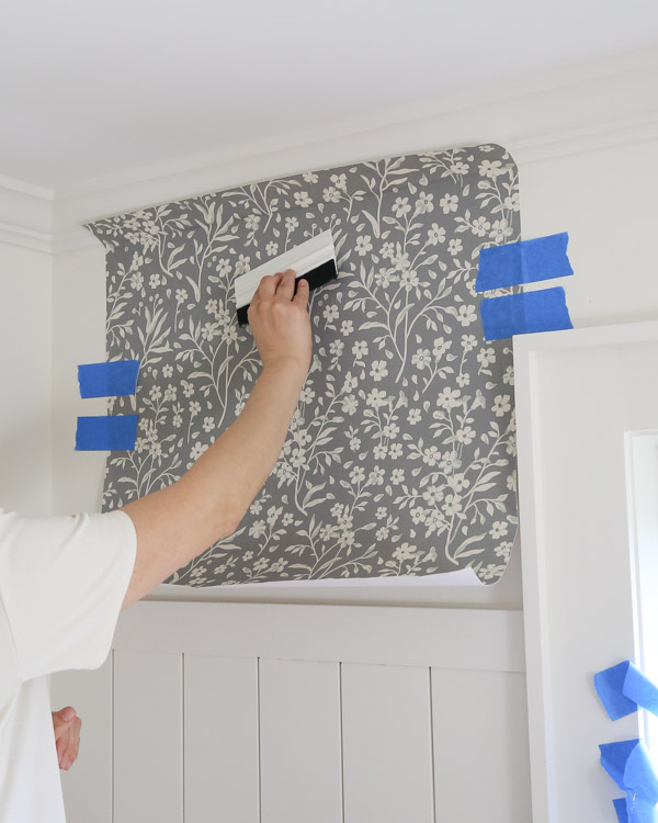 smoothing wallpaper on wall for how to install peel and stick wallpaper to wall
