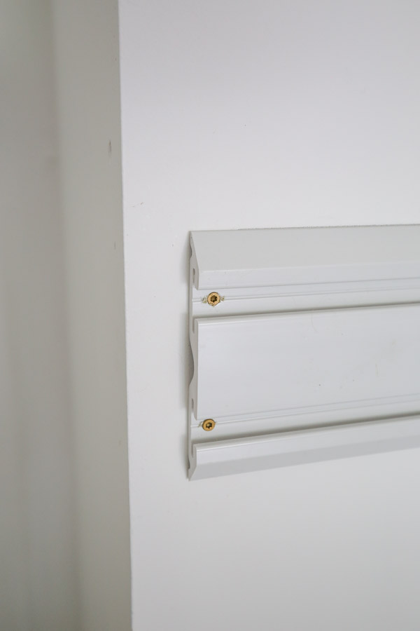 screws installed at ends of gladiator geartrack wall tracks into wall studs