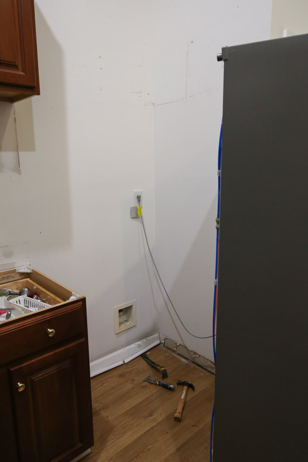 remove baseboard behind refrigerator