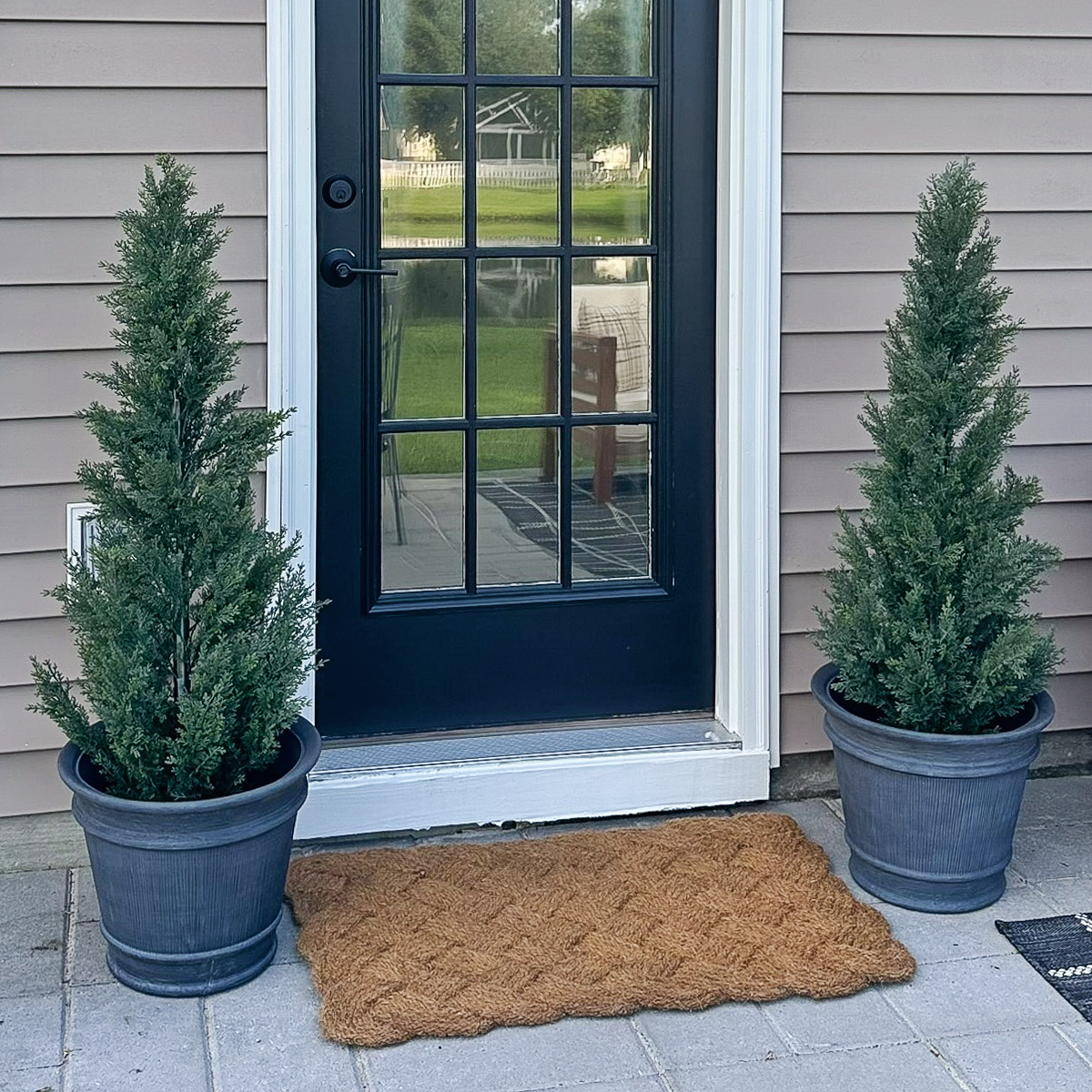 Faux cedar trees are the perfect easy porch and patio decor for the fall, winter, or anytime of the year! Front Porch decor ideas, easy patio decor ideas on a budget!