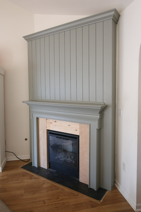DIY shiplap fireplace wall with electric fireplace insert