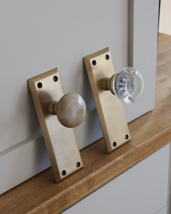 vintage antique brass door knob and glass door knob